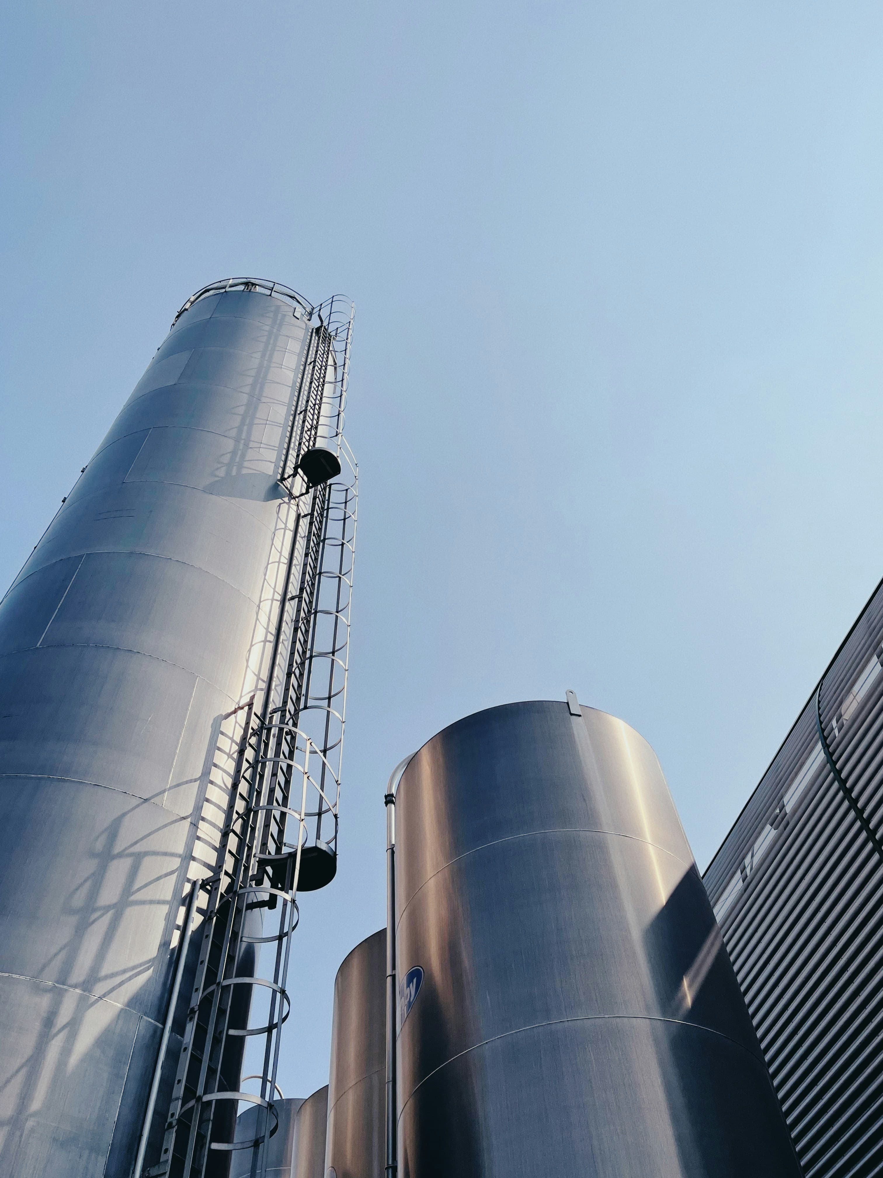 Industrial cooling towers against a clear sky